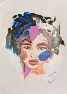 Femme au visage plein de couleurs